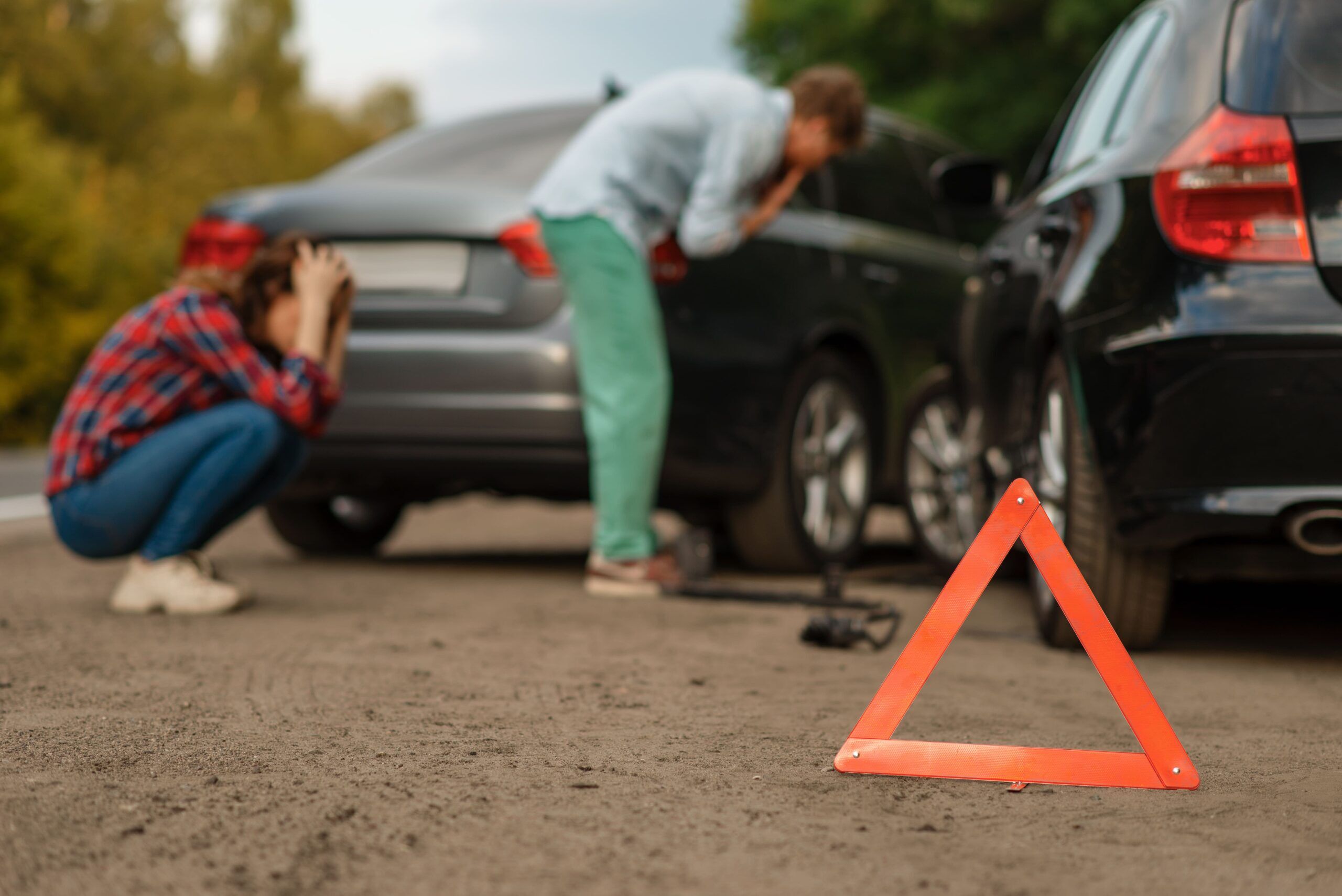 car-accident-on-road-male-and-female-drivers-UKZ6RHS-min